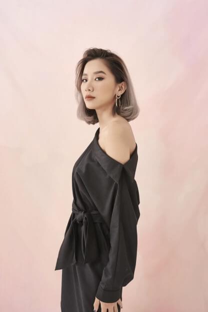 a girl in a black dress