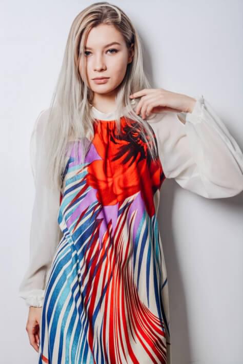 a girl in a colored dress